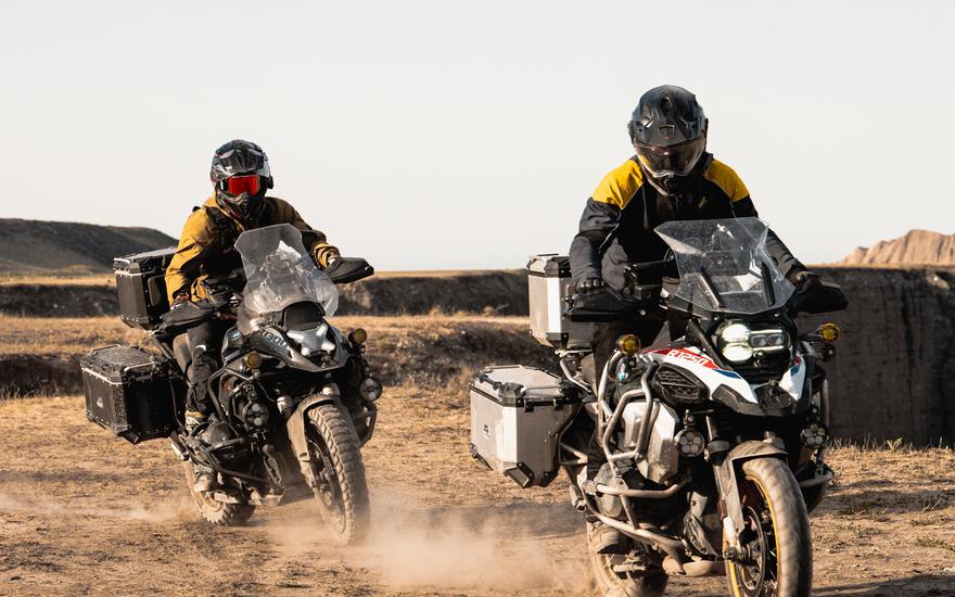 Two riders on a dirt trail